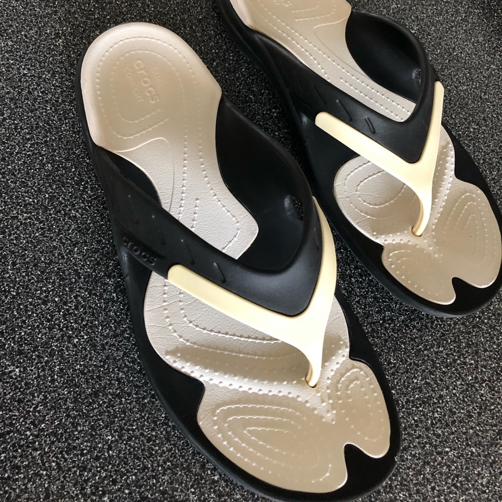 Black and white size 13 Crocs flip flops/sandals. Very lightly worn, great shape